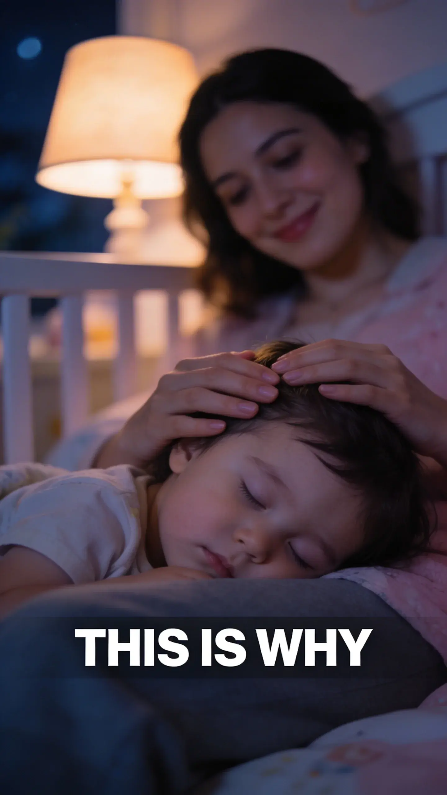 MACRO EMOTION: MACRO EMOTION, BASE: vertical 9:16, ultra-tall composition, SCENE: A close-up, shallow depth of field shot focusing on a mother's hands gently caressing her child's hair as the child sleeps peacefully on her lap in a dimly lit nursery at night. Her face, slightly out of focus in the background, shows a subtle, contented smile, a moment of profound relief and quiet satisfaction. photorealistic, 8K, shallow depth of field, warm pastel tones, film aesthetic, no logos, no watermarks, TEXT POSITION: BOTTOM-CENTER, OVERLAY: text says exactly: "THIS IS WHY", bold readable font, high contrast white on dark, LIGHT: Soft, focused light from a bedside lamp, MOOD: Relieved, content, understanding